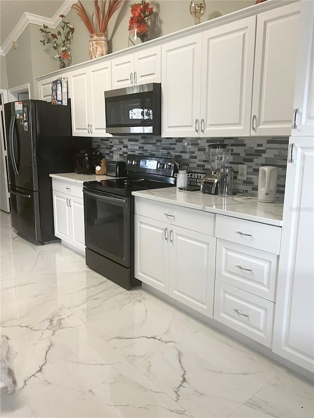 kitchen with backsplash, white cabinetry, black appliances, and ornamental molding