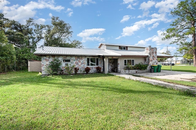 view of front of home with a front yard