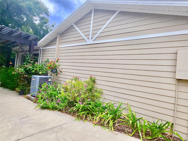 view of home's exterior featuring central air condition unit