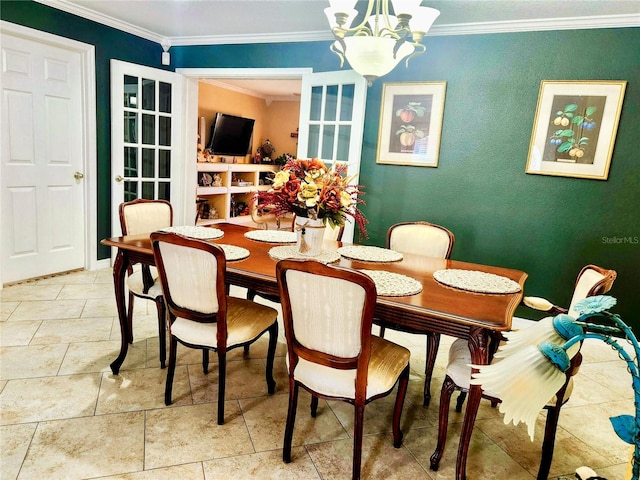 dining area featuring ornamental molding and an inviting chandelier