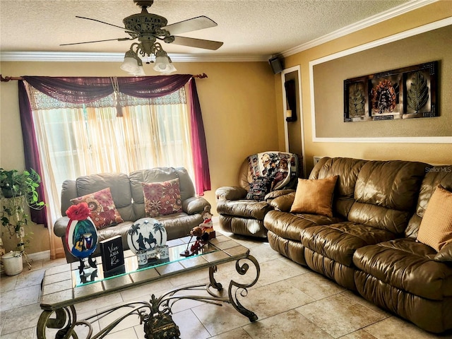 living room featuring a textured ceiling, ceiling fan, and ornamental molding