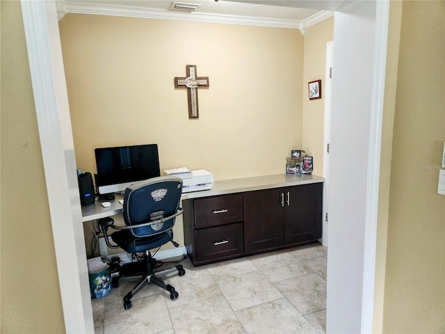 office featuring built in desk and crown molding