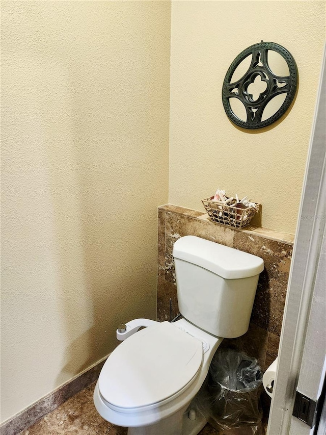 bathroom featuring toilet