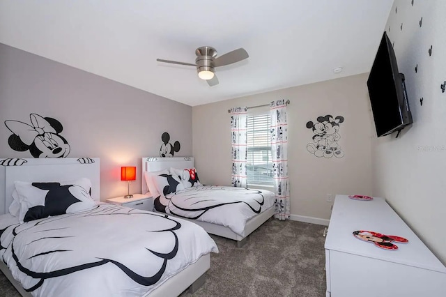 bedroom featuring dark colored carpet and ceiling fan