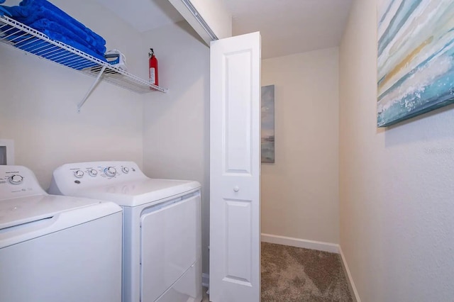 washroom featuring carpet flooring and washing machine and dryer