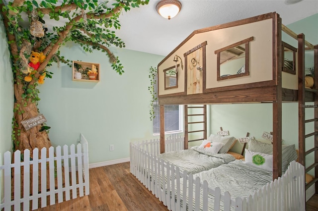 bedroom featuring wood-type flooring