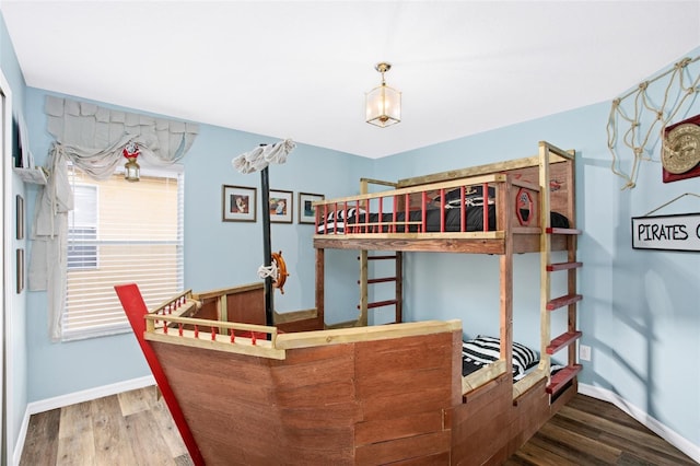 bedroom featuring hardwood / wood-style flooring