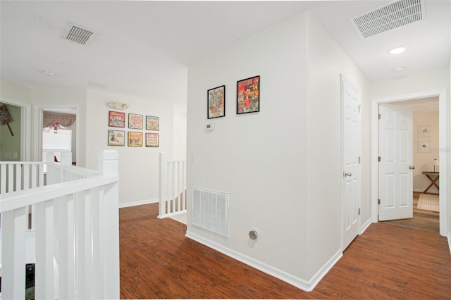 hall featuring dark wood-type flooring