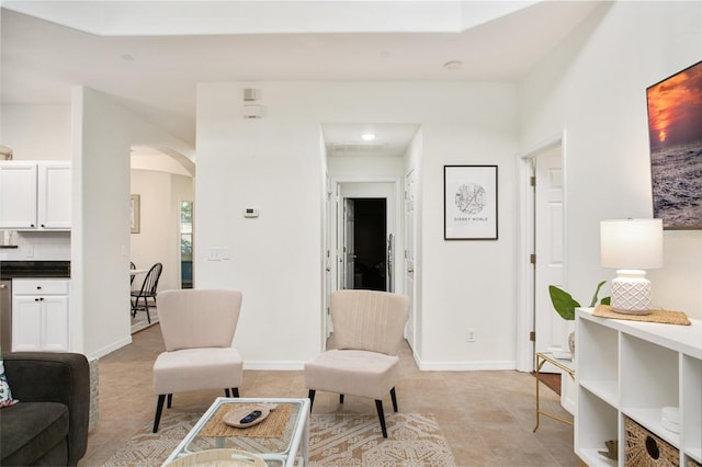 living room with light tile patterned floors