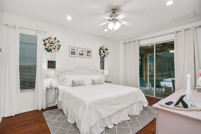 bedroom featuring ceiling fan, access to exterior, and dark wood-type flooring