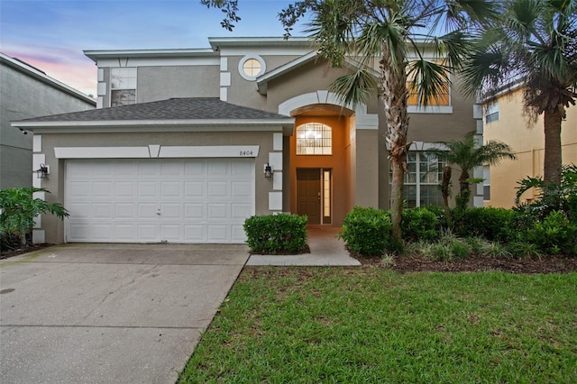 view of front of home with a garage