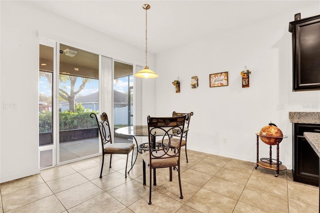 view of tiled dining space