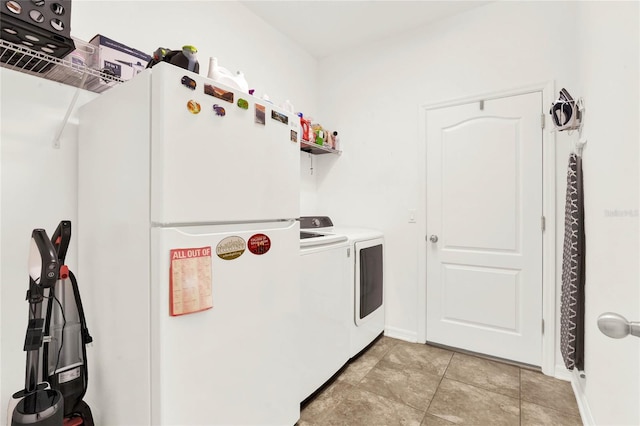 washroom featuring separate washer and dryer