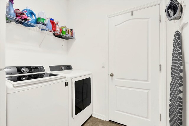 washroom with separate washer and dryer