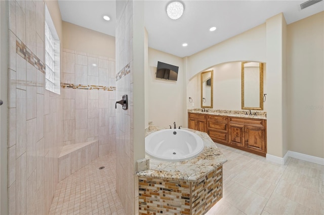 bathroom with vanity, tile patterned floors, and independent shower and bath