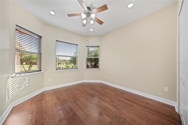 spare room featuring ceiling fan and wood-type flooring