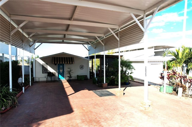 exterior space featuring a carport