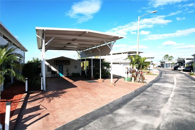 view of patio / terrace with a carport