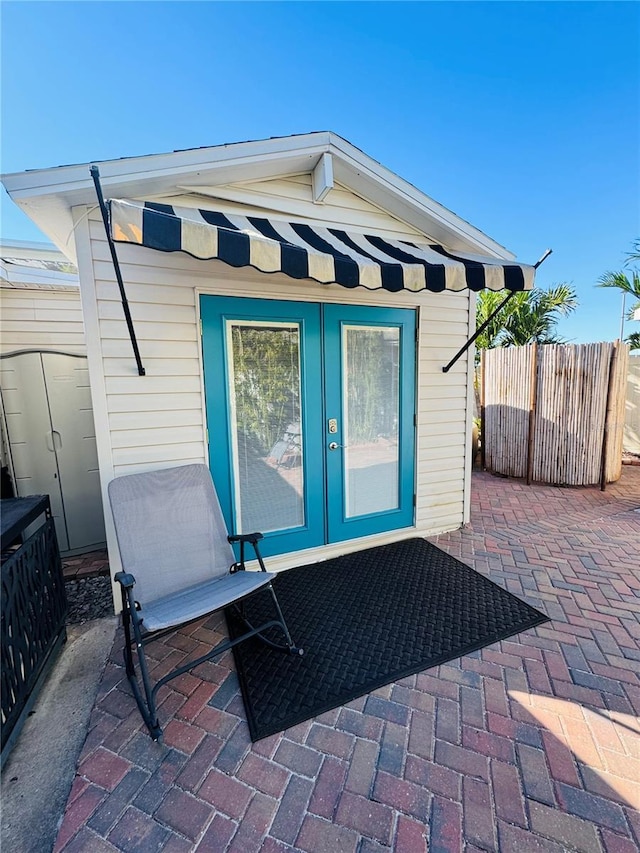 view of outdoor structure featuring french doors