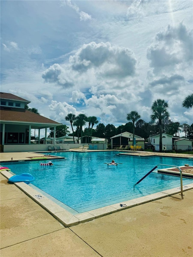 view of pool featuring a patio area