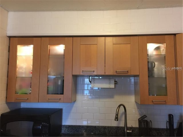 kitchen with tasteful backsplash