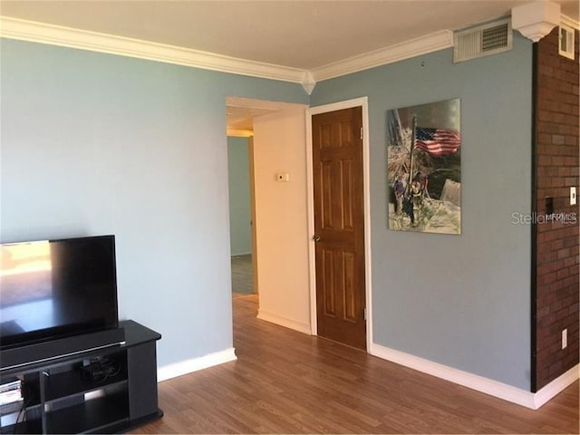 living room with crown molding and dark wood-type flooring