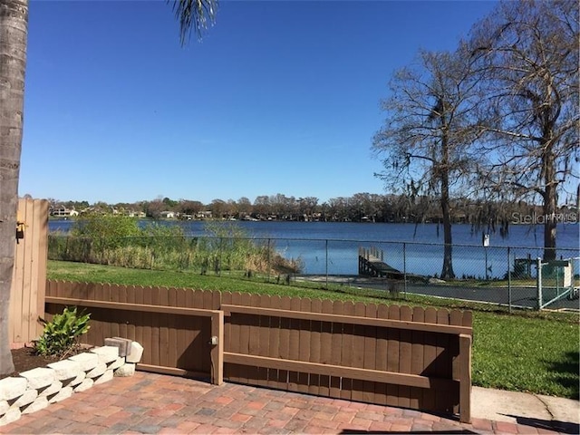 view of patio featuring a water view