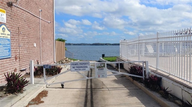 view of patio / terrace featuring a water view