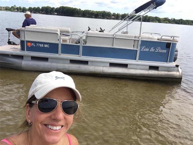 view of dock with a water view