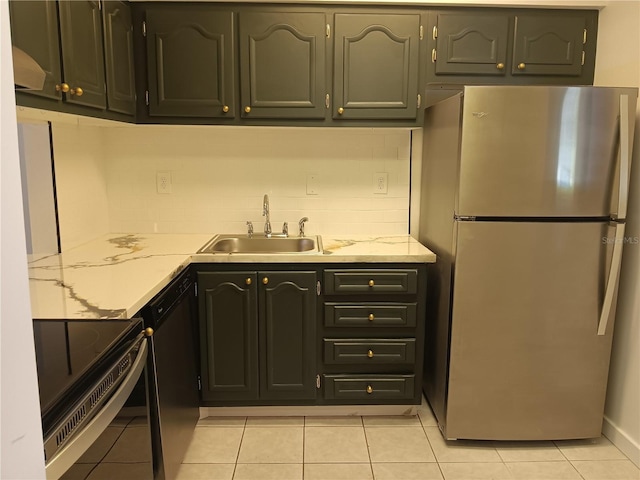 kitchen with light tile patterned floors, range with electric stovetop, a sink, black dishwasher, and freestanding refrigerator