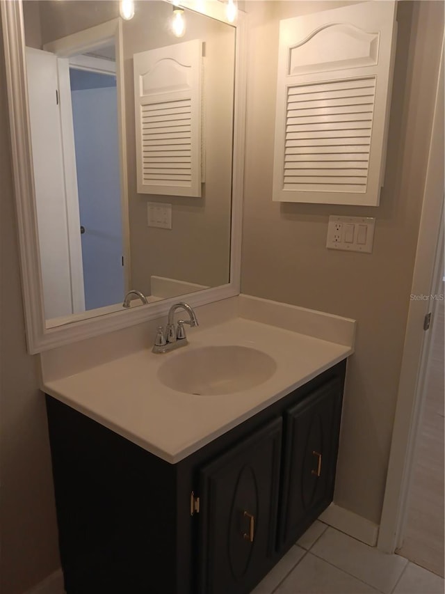 bathroom featuring vanity and tile patterned floors