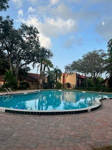 pool featuring a patio area