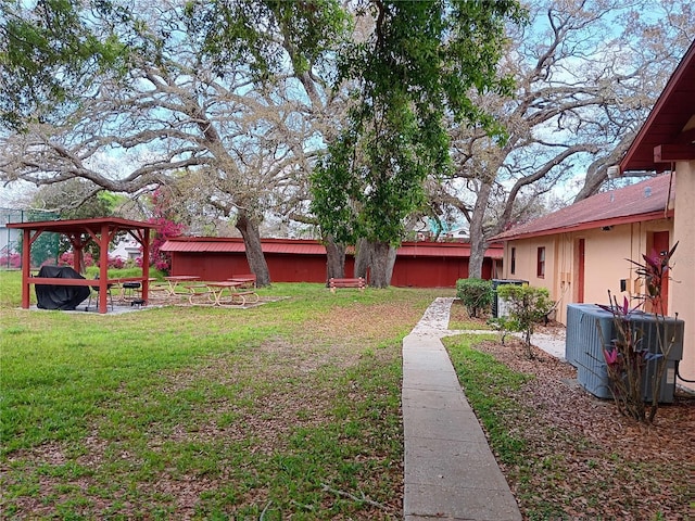 view of yard featuring central AC