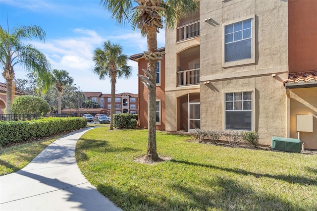 surrounding community featuring a lawn