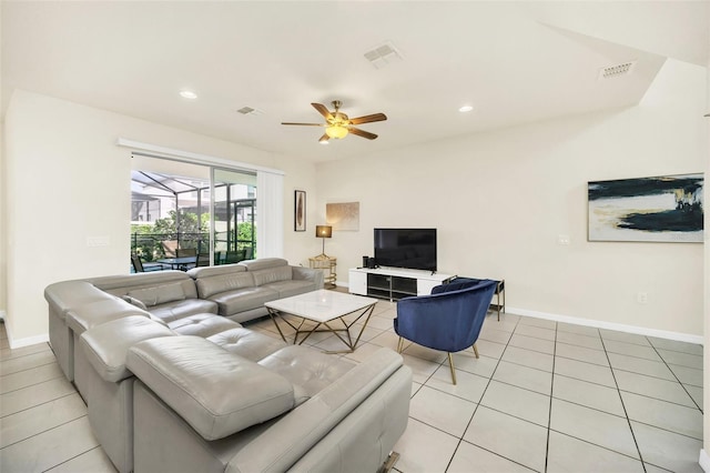 2468 Dubai St, Kissimmee, FL 34747 - living room featuring a ceiling fan, light tile patterned flooring, and recessed lighting