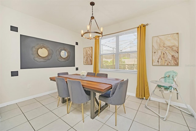 2468 Dubai St, Kissimmee, FL 34747 - dining space with a chandelier and light tile patterned floors