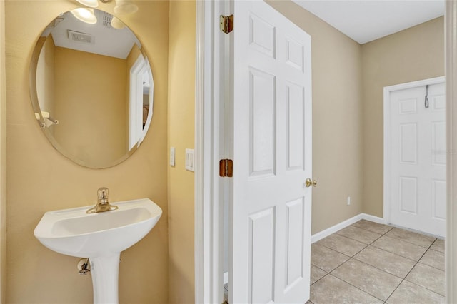 bathroom featuring tile patterned flooring