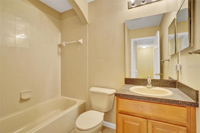 full bathroom with vanity, toilet, and tiled shower / bath