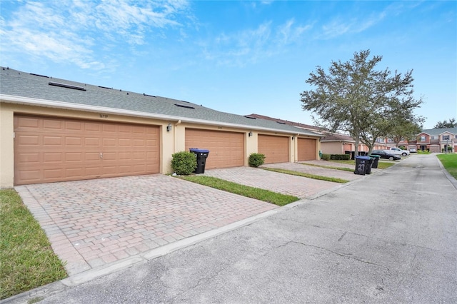 ranch-style home with a garage