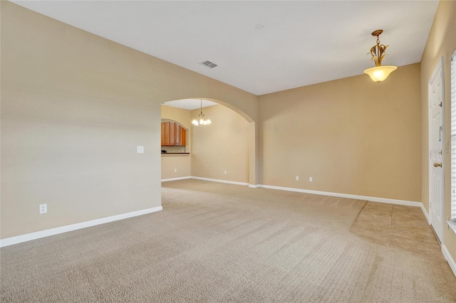 view of carpeted spare room