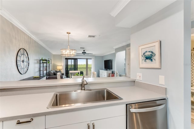 kitchen featuring dishwasher, white cabinets, crown molding, and sink