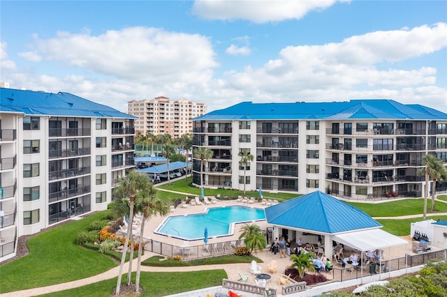 view of swimming pool with a patio area