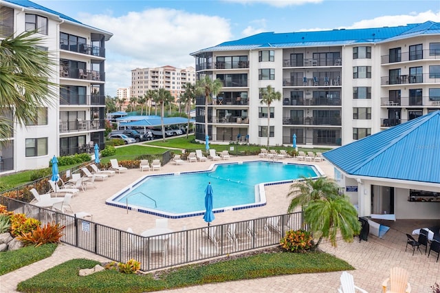 view of pool featuring a patio