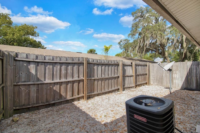 view of yard featuring central air condition unit