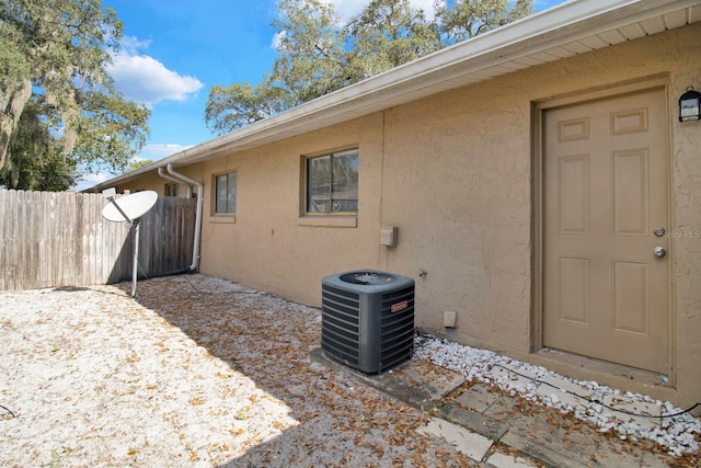 view of exterior entry with cooling unit