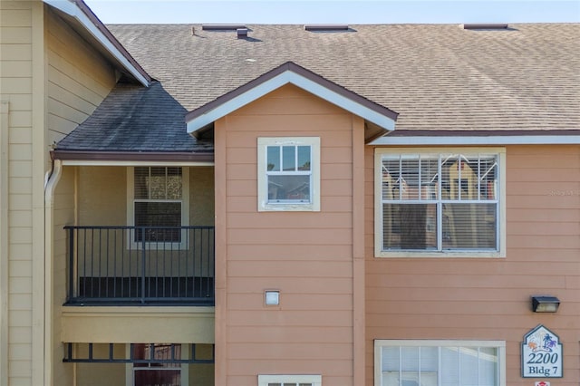 view of property exterior featuring a balcony