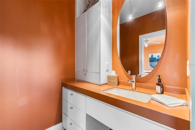 bathroom with vanity and ceiling fan