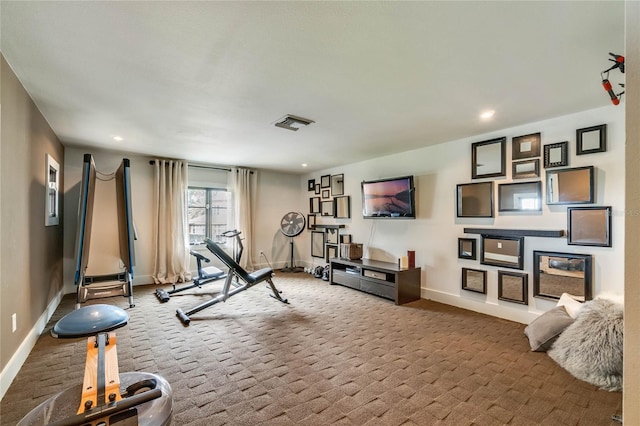 workout room featuring carpet floors