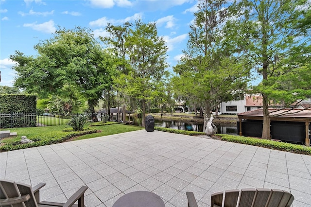 view of patio / terrace with a water view