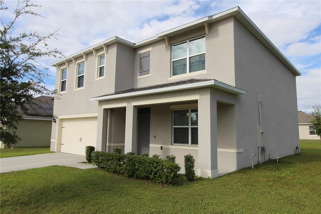 view of front facade featuring a front yard and a garage